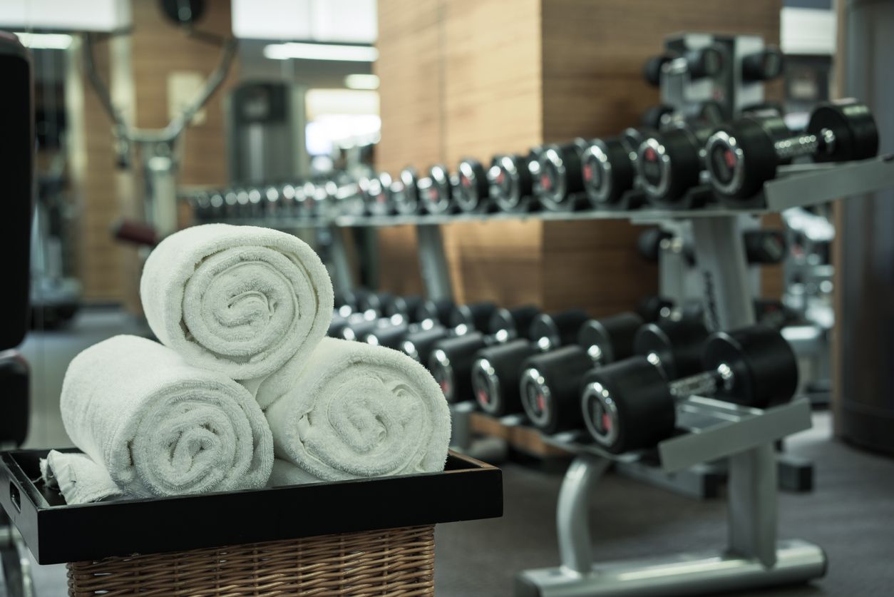 Clean towels folded in gym.
