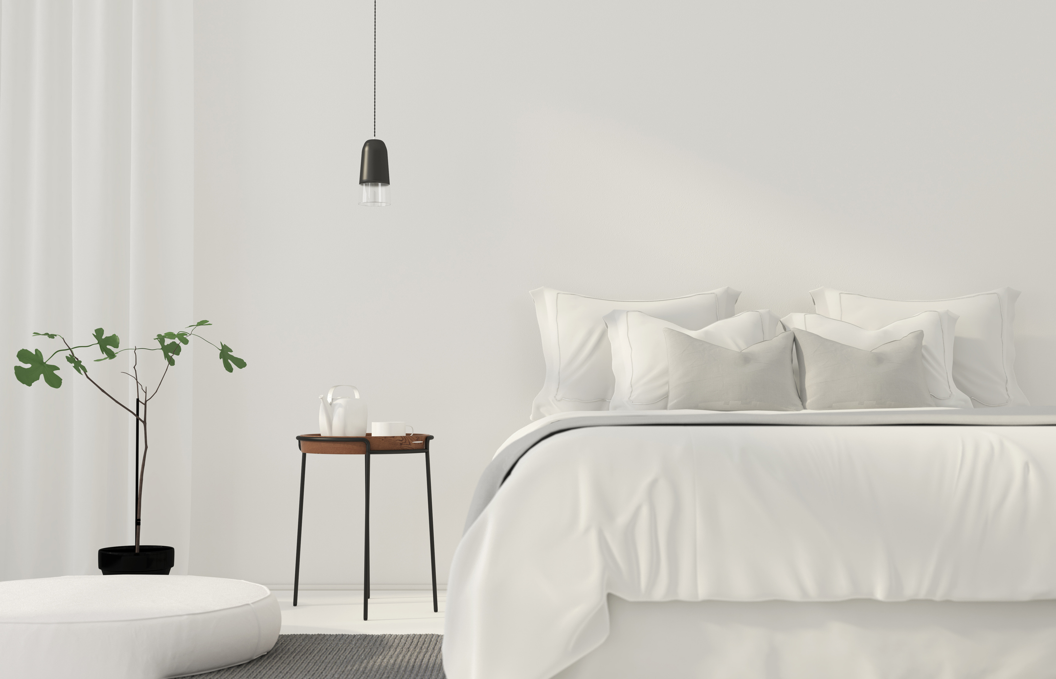 Minimalistic room with clean bedding.
